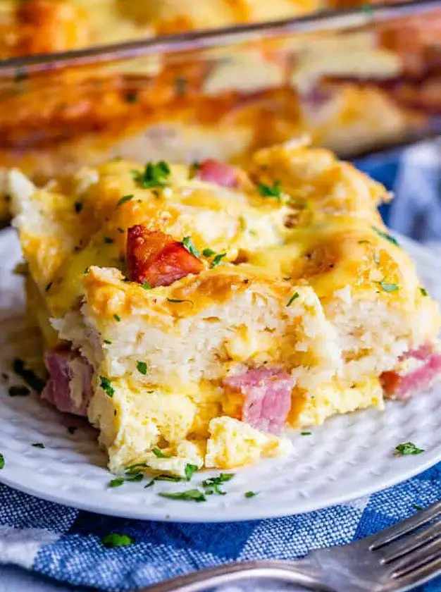 Cheesy Ham and Egg Breakfast Casserole with Biscuits