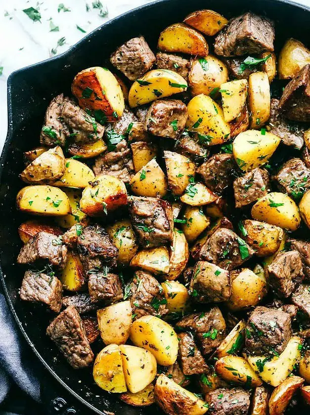 Garlic Butter Herb Steak Bites with Potatoes