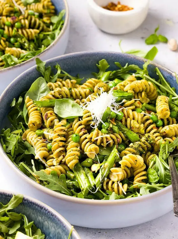 Pesto Pasta with Arugula, Asparagus, Peas, and Pistachios