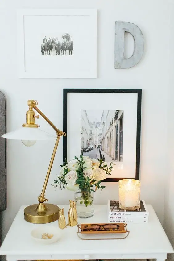 GOLD ACCENTS AND WALL PICTURES