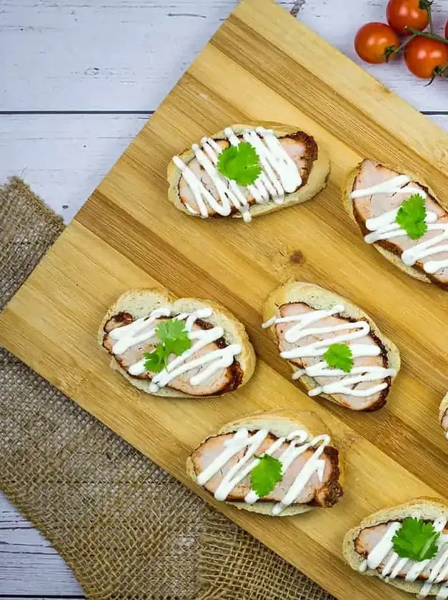 Pork Tenderloin Crostini with Lime Crema