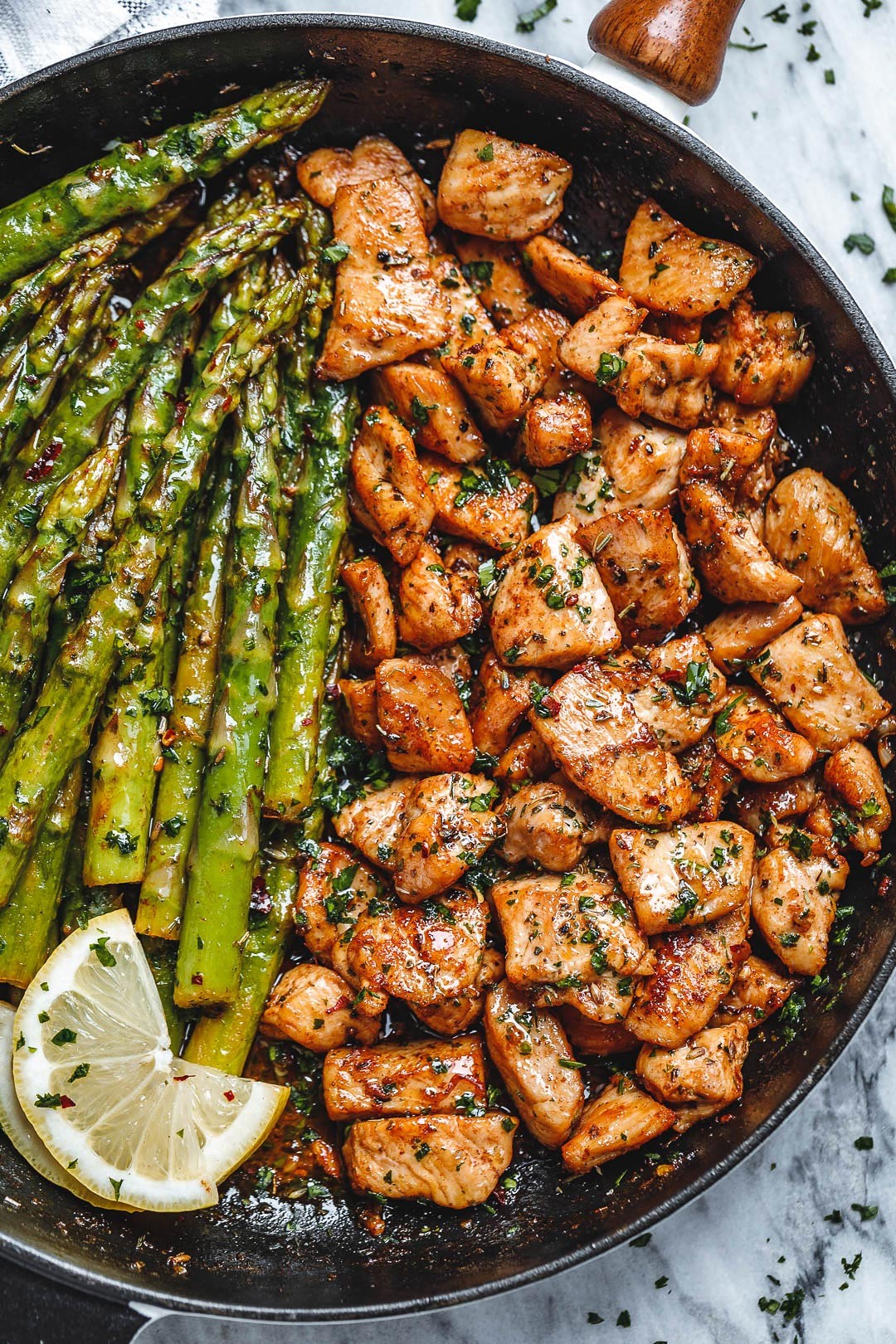 GARLIC BUTTER CHICKEN BITES WITH LEMON ASPARAGUS