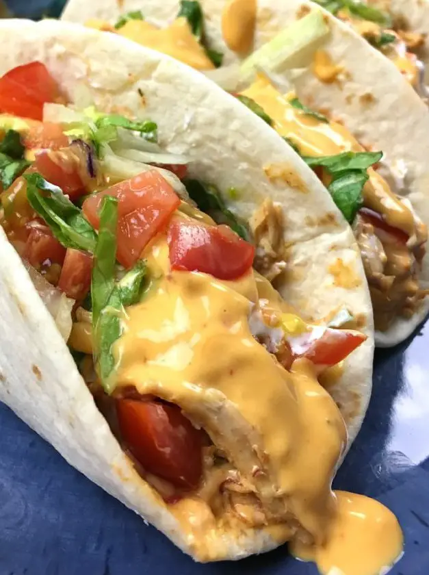 Slow Cooker Queso Chicken Tacos