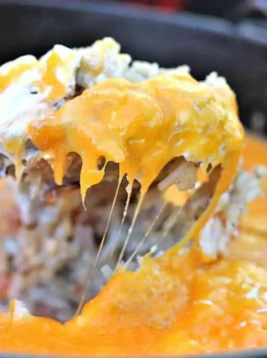 Cheesy Dutch Oven Potatoes