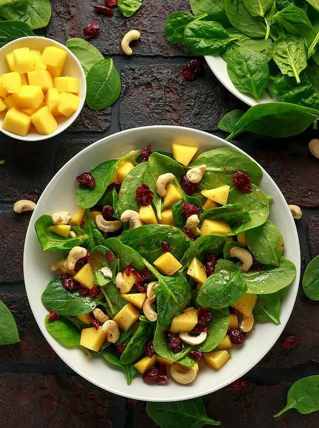 Spinach and Mango Salad with Cranberries and Cashews